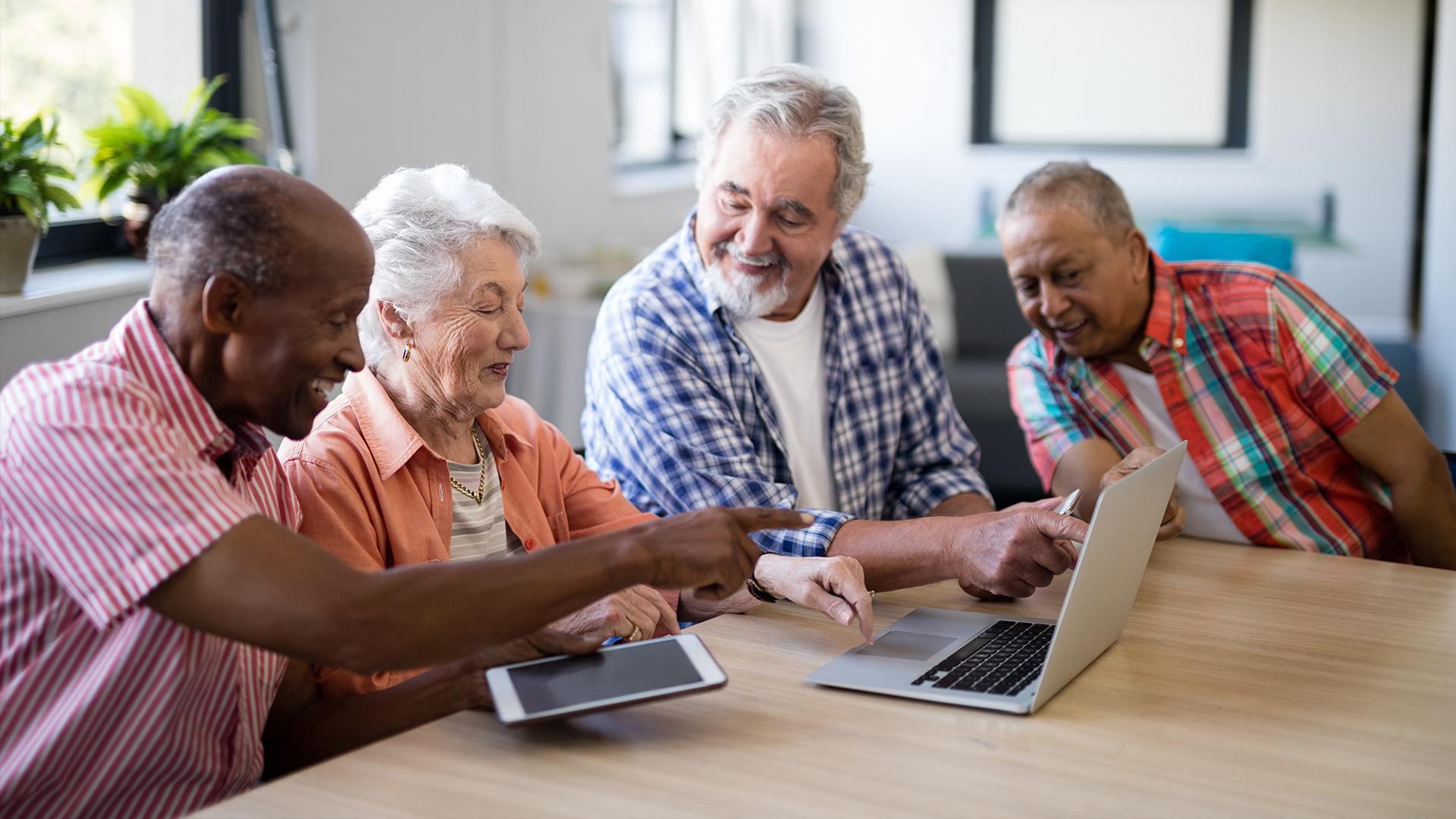 men and women participating in online activities for seniors